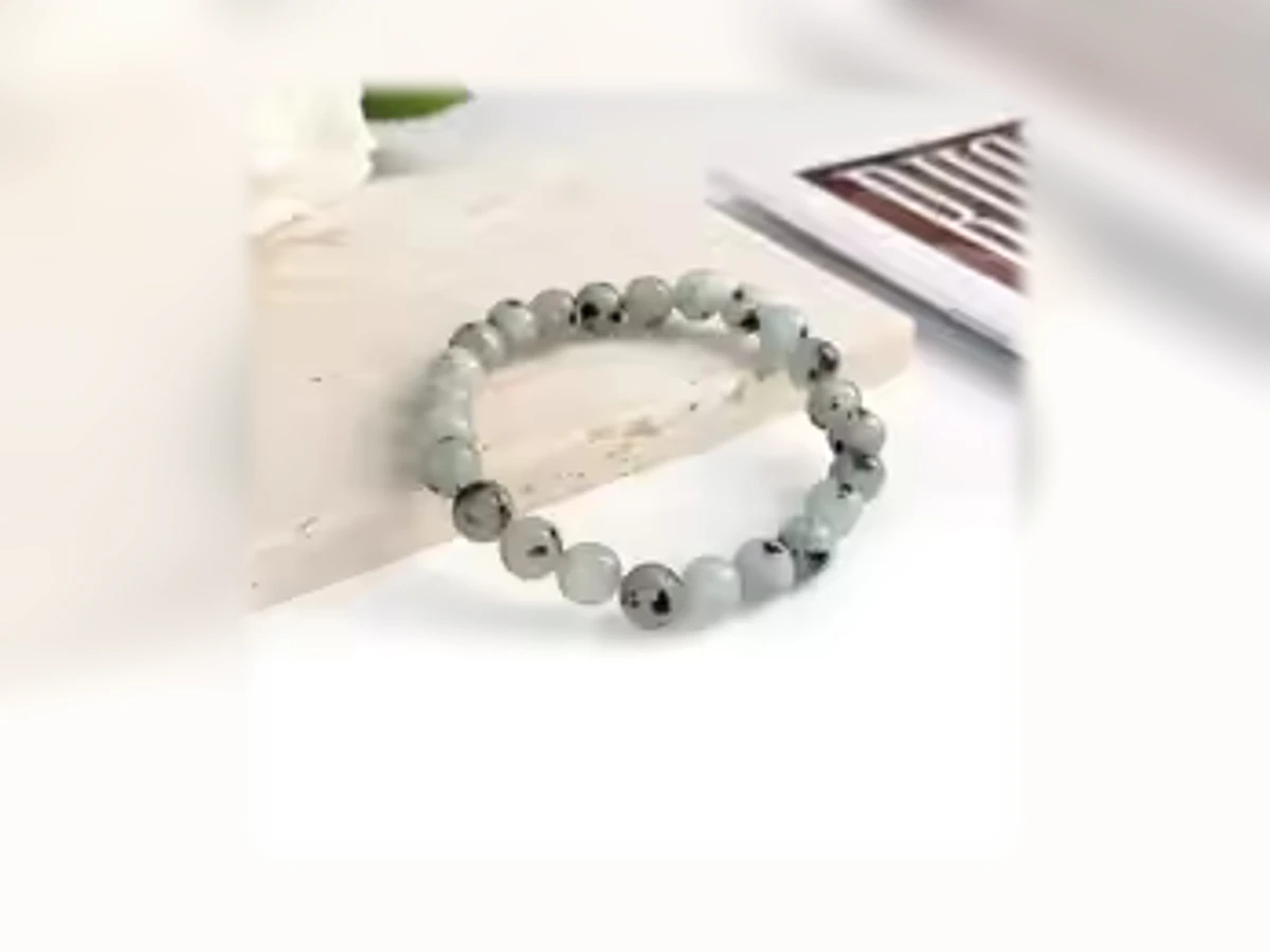 Jadestein-Natursteinarmband Silbersprenkel in Grau und Weiß mit dunkler Zeichnung