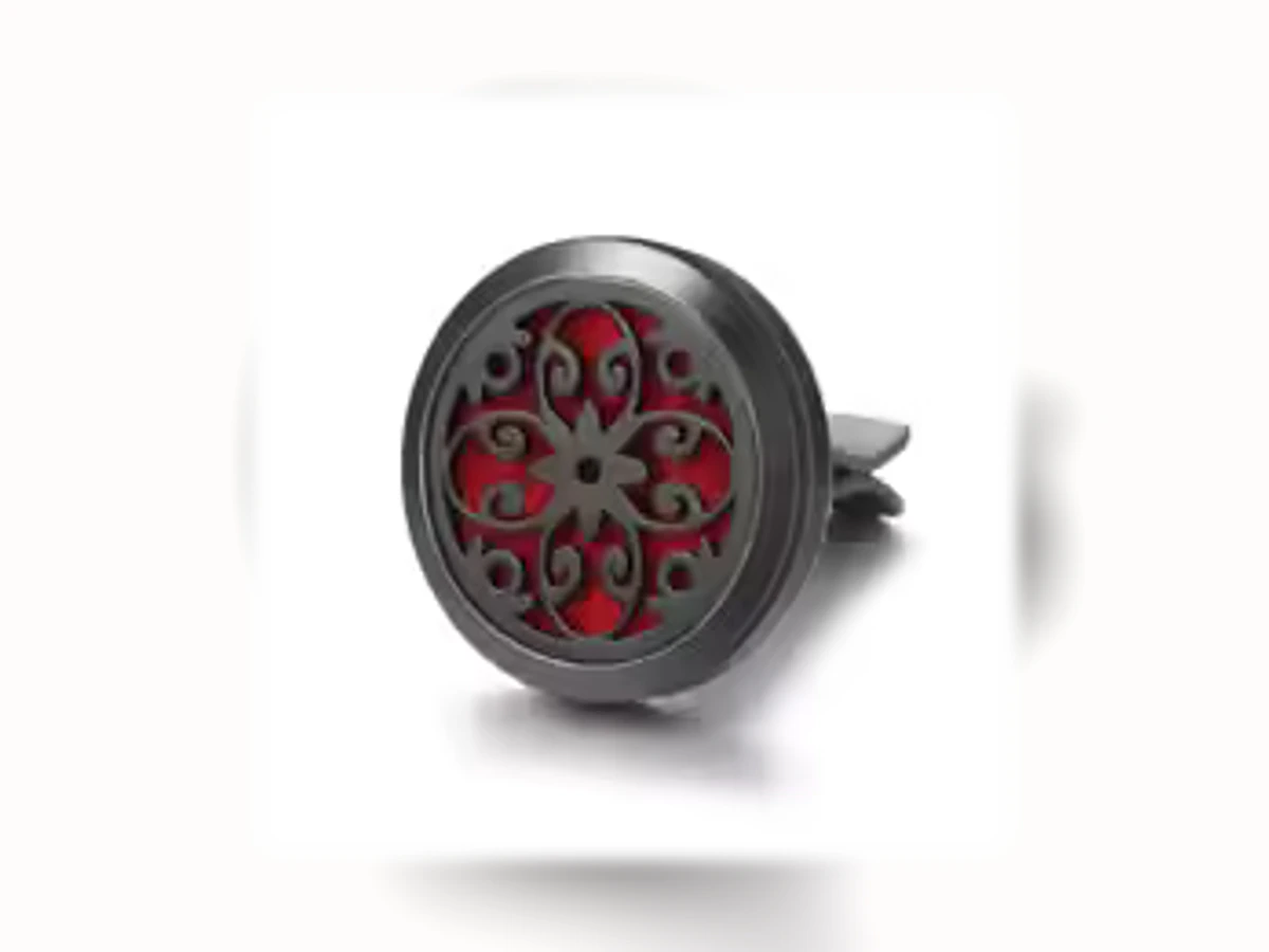 Schwarzer runder Aromatherapie-Autoclip mit Motiv Blütenornament